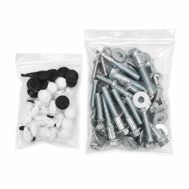 Two clear plastic zip bags containing hardware parts on a white background. The left bag holds black and white plastic clips or fasteners, and the right bag holds silver metal screws, washers, and nuts.