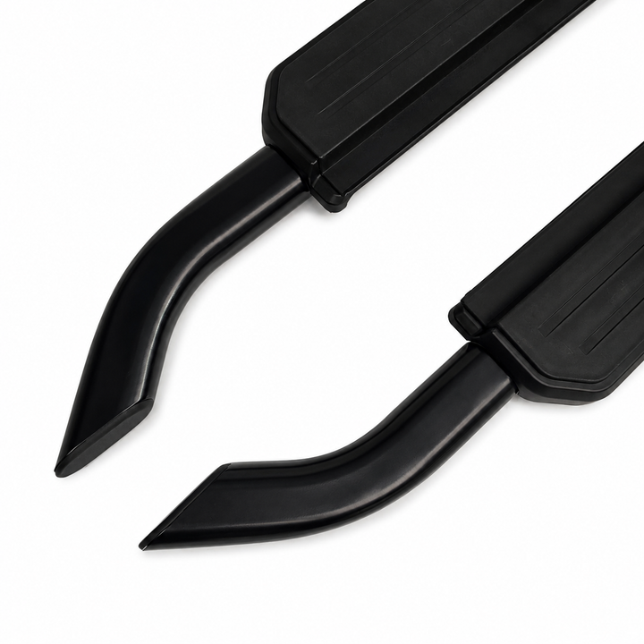 A pair of black curved metal exhaust tips with matching black rectangular flanges, shown on a plain white background.