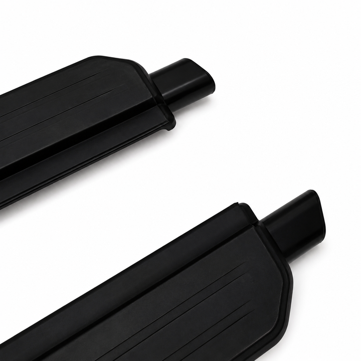 Two black textured grip pads with cylindrical end caps, shown on a clean white background.