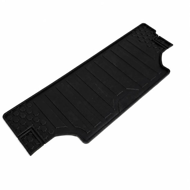 A black rubber cargo floor mat with textured ridges and raised bumpers, shown on a plain white background.