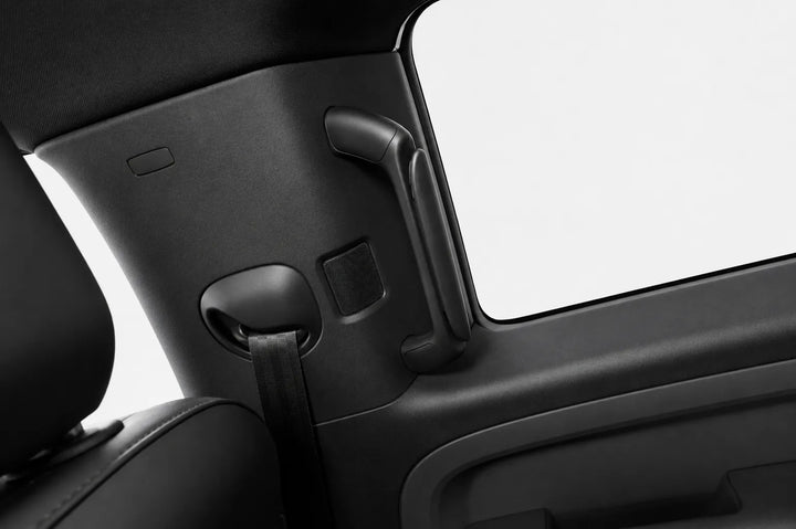 Photographed in a white studio with added interior grab handle after the conversion takes place