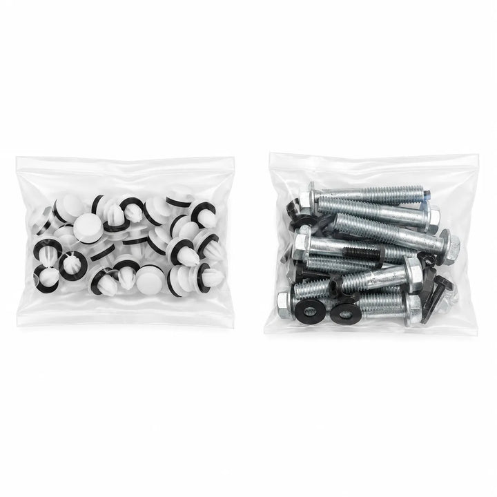 Two clear plastic bags containing hardware parts on a white background. The left bag holds white plastic wall anchors with black rubber rings, and the right bag holds silver metal screws and bolts with black washers.