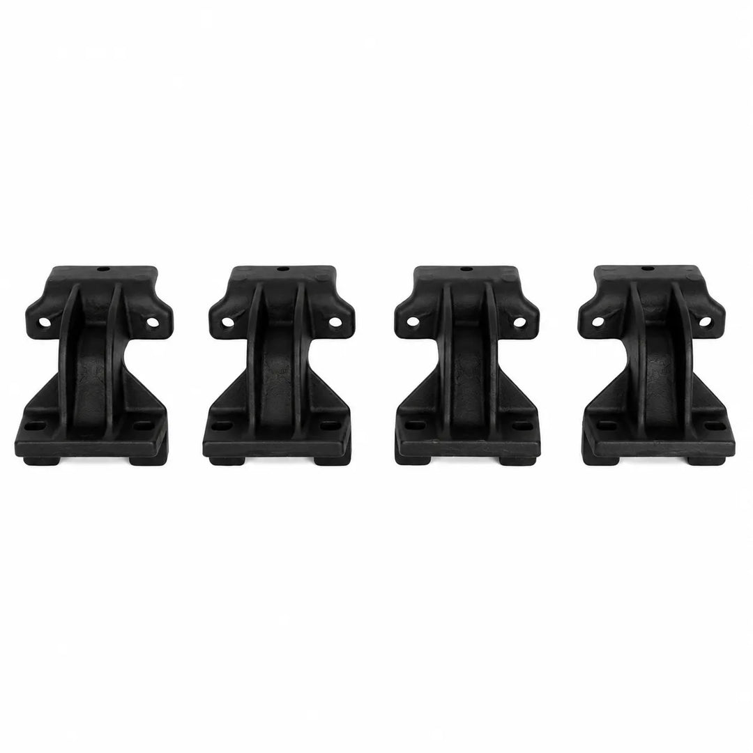 Four black plastic mounting brackets arranged in a row on a plain white background.