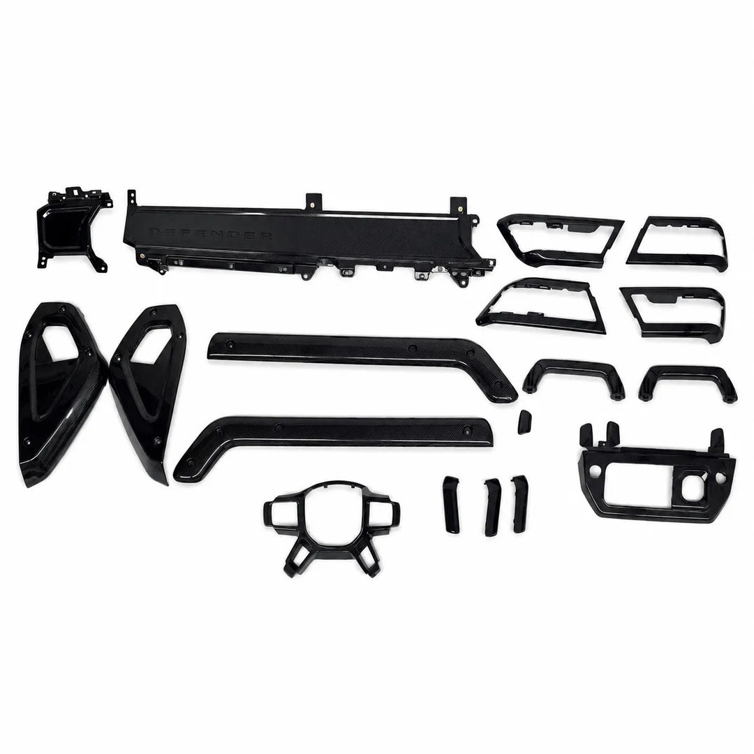 A set of black carbon interior trim for a L663 vehicle, laid out flat on a white background.