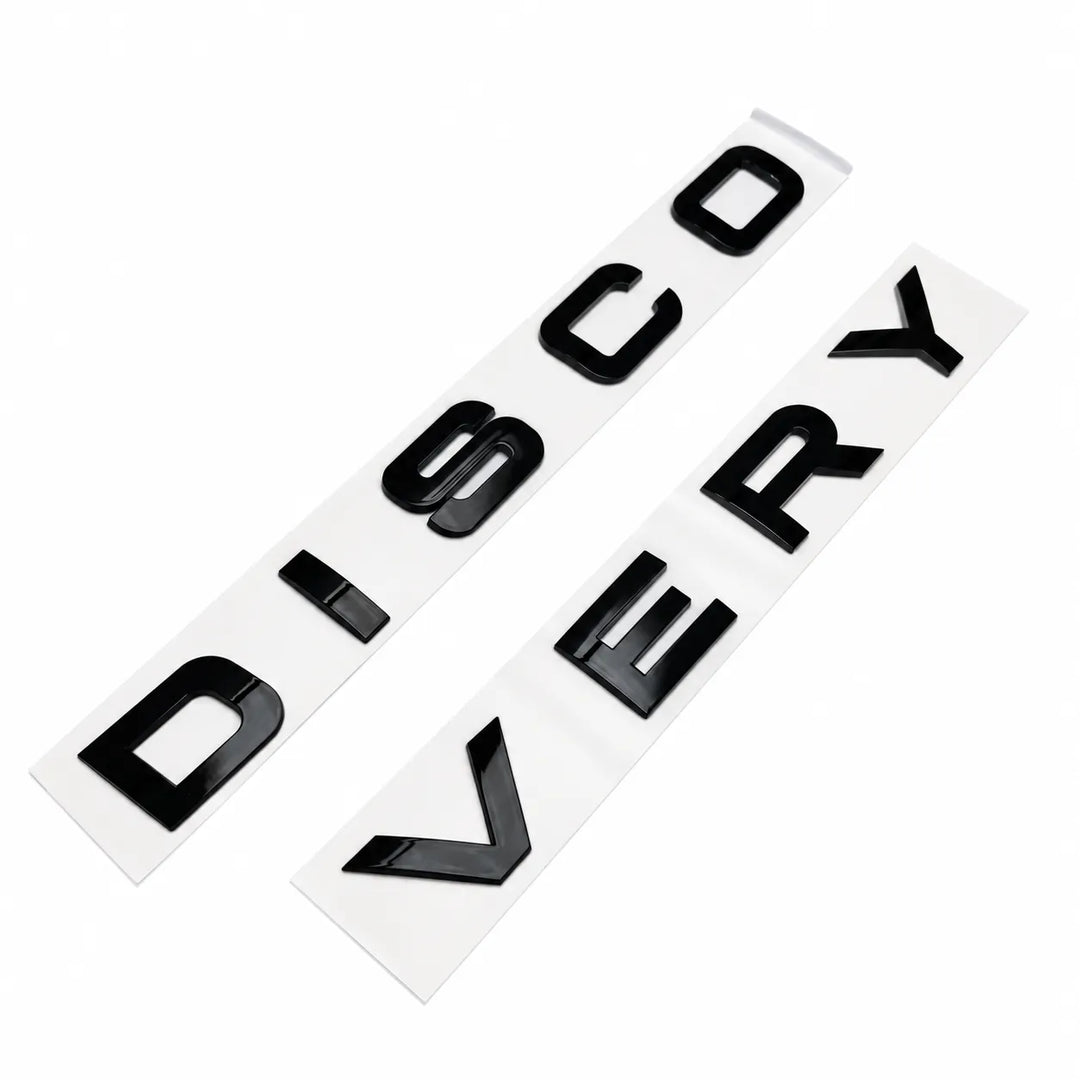 discovery 5 disco lettering gloss black finish on a white background 'DISCOVERY' bonnet logos 