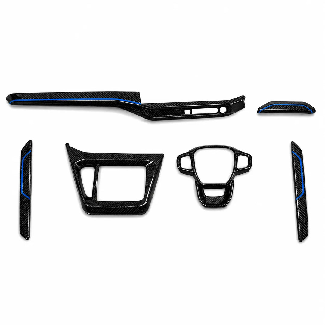 A set of six black carbon fiber automotive trim pieces with blue accent lines, arranged on a plain white background.