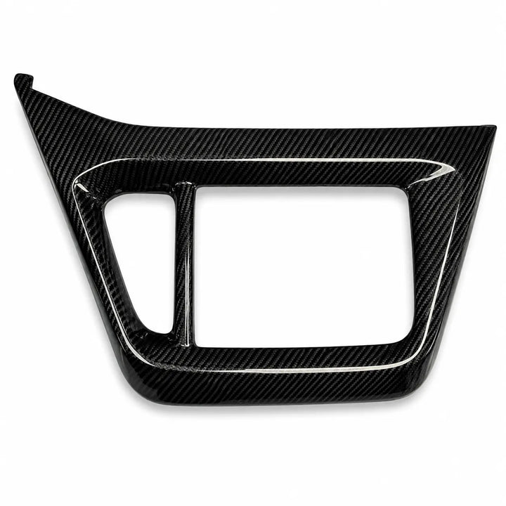 A glossy carbon fiber trim piece with a distinctive diagonal weave pattern, shown on a clean white background.