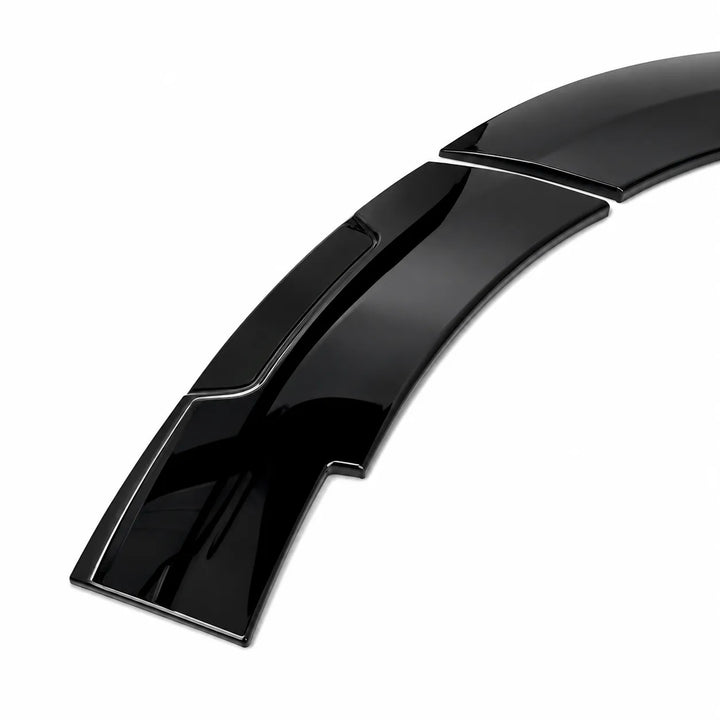 A glossy black curved automotive wheel arch lip badges, with aggressive styling for ford van displayed on a clean white background.