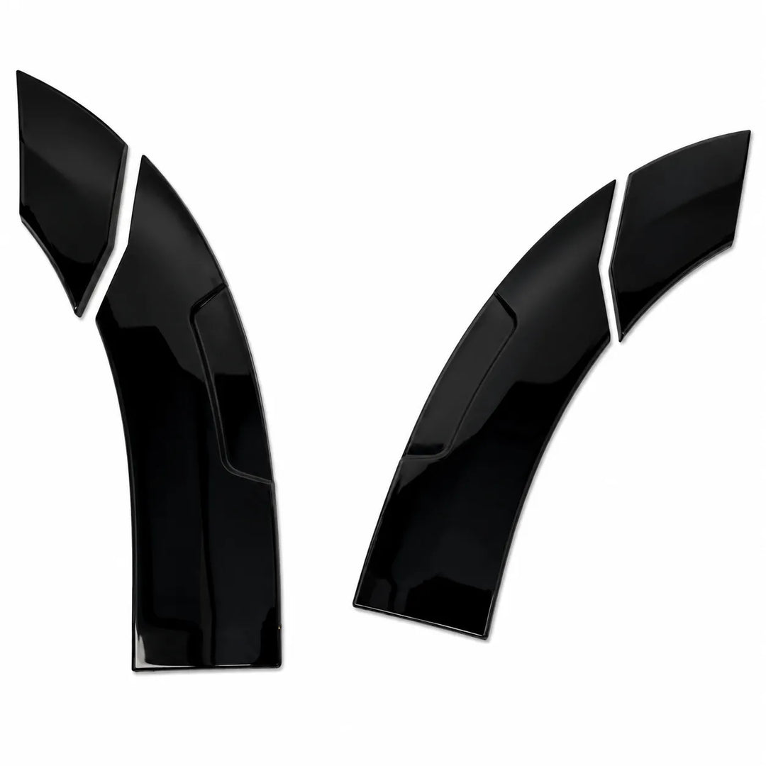 A pair of glossy black curved automotive wheel arch lip badges, displayed on a clean white background.