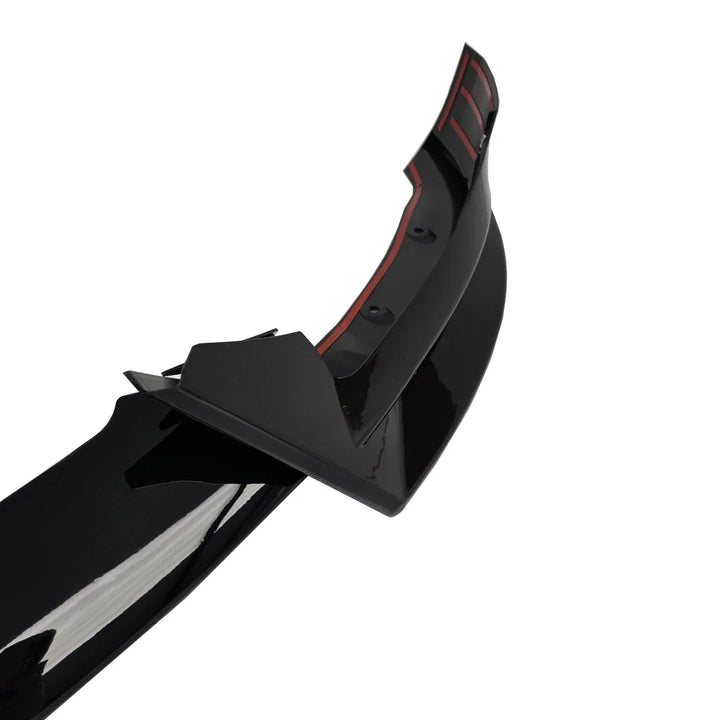 A glossy black automotive rear spoiler wing with red double sided tape lines along the inner edge, shown on a plain white background.