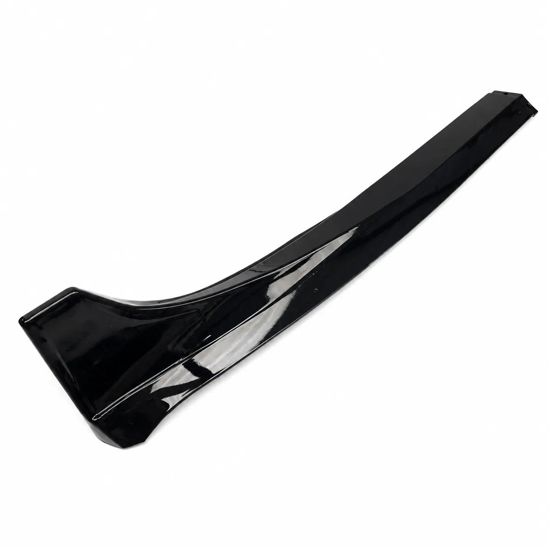 A glossy black plastic automotive trim piece, side skirt fender trim, shown on a plain white background.