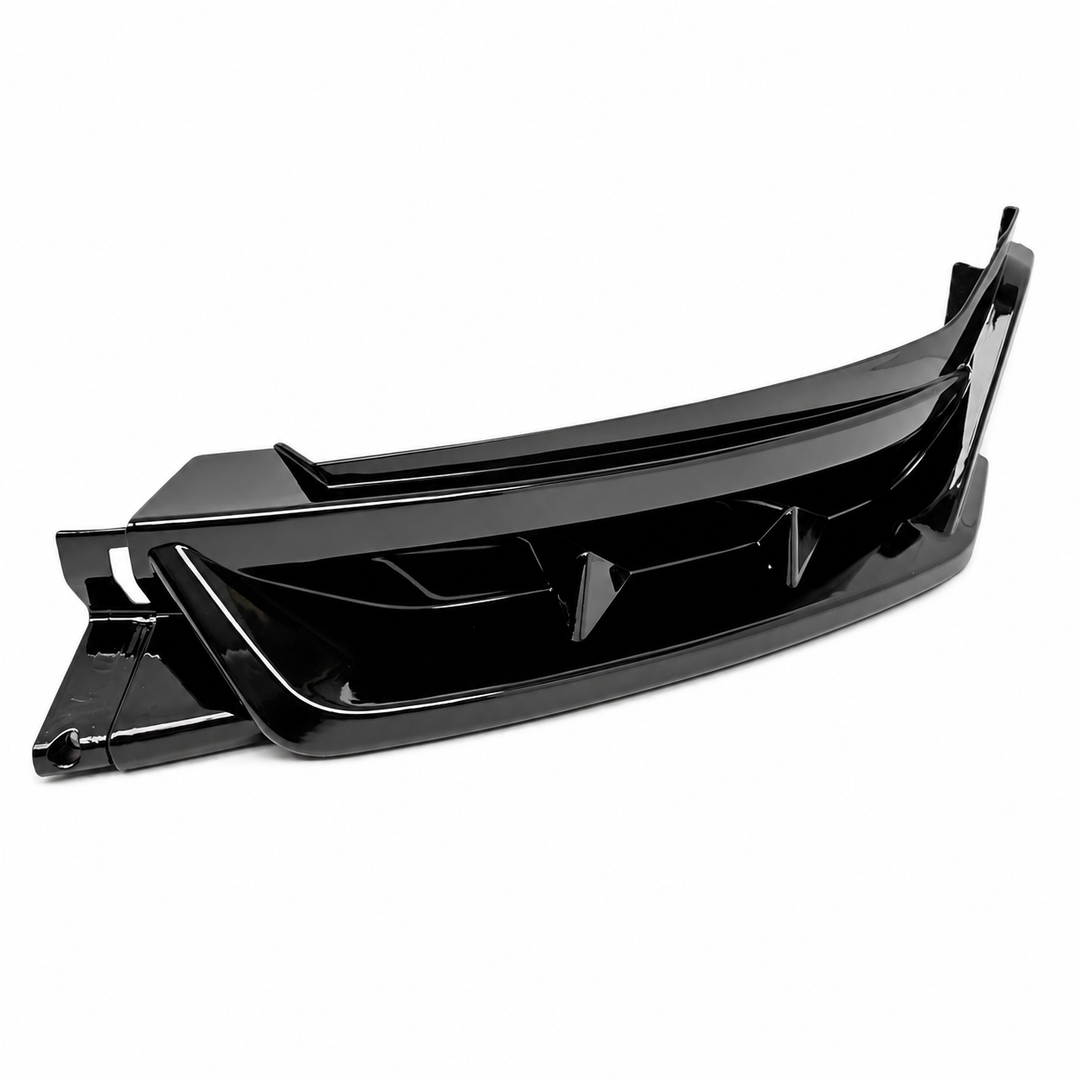 A glossy black plastic automotive part, likely a bumper trim or body panel insert, shown on a plain white background.