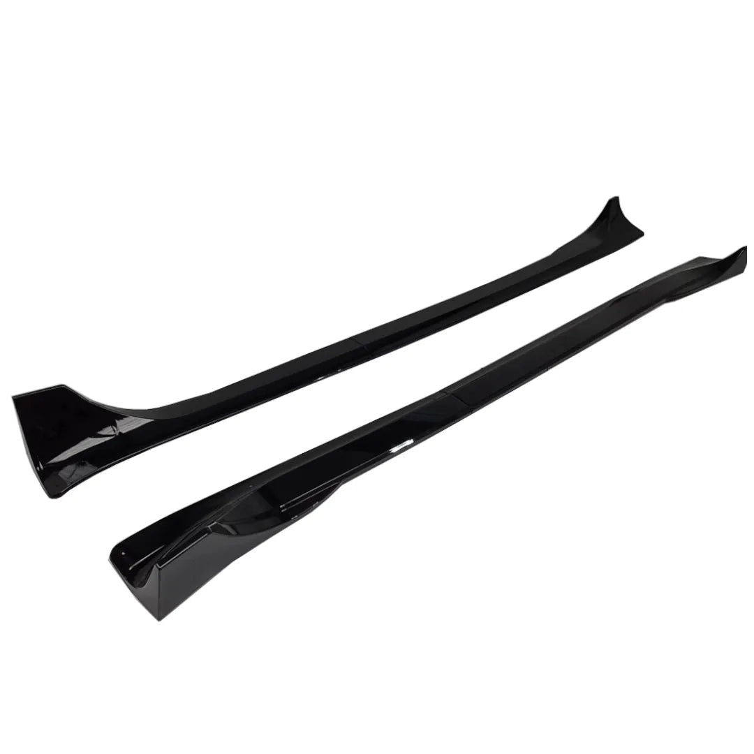 A Tesla Model Y pair of black side skirts, long black side skirt pieces displayed below on a white background. 