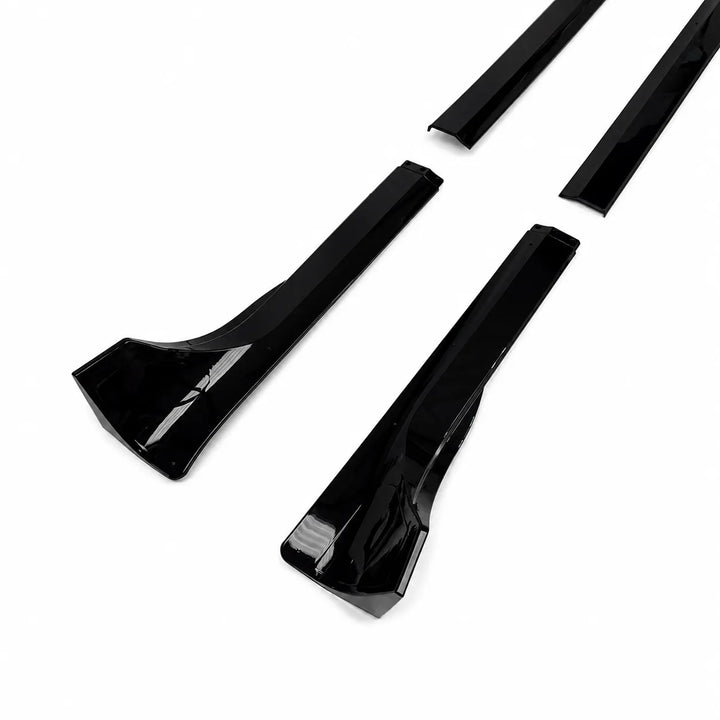 Set of black car side skirts on a white background