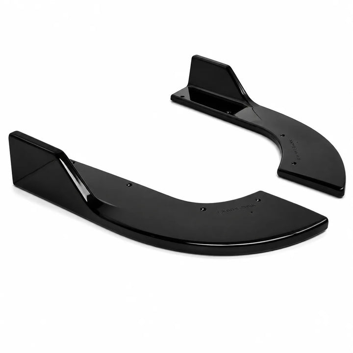 A pair of glossy black curved automotive body panels or trim pieces, photographed on a clean white background.