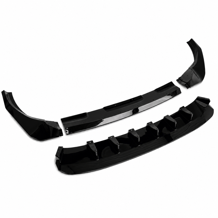 A set of glossy black automotive body trim pieces, including a lower lip diffuser splitter and matching inner trim sections, displayed on a clean white background.
