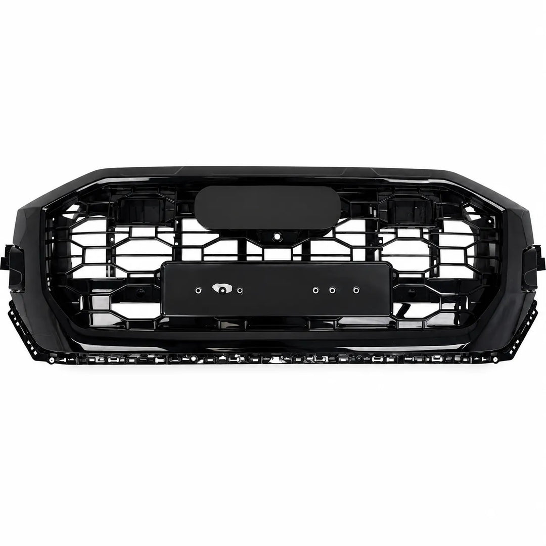 A black automotive front grille with a RS styling and honeycomb pattern, shown against a plain white background.