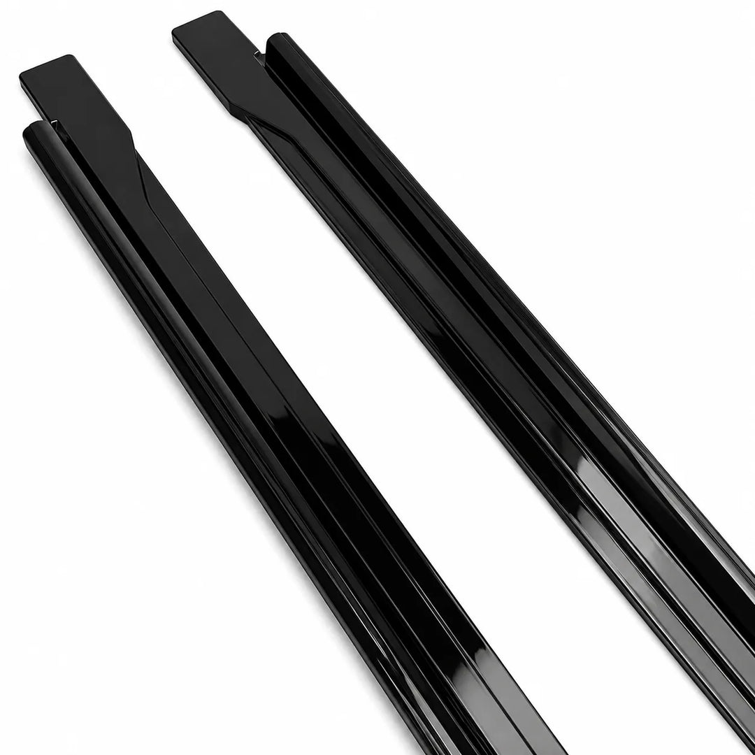 Two, single piece close up end shot of glossy black ABS plastic side track shown diagonally on a plain white background.