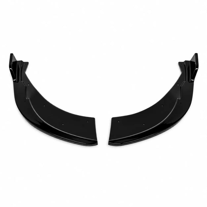 A pair of black plastic curved components, likely side spats parts, shown against a plain white background.