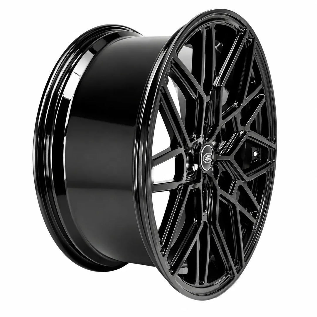 A glossy black multi-spoke alloy wheel rim shown at a three-quarter angle on a plain white background.