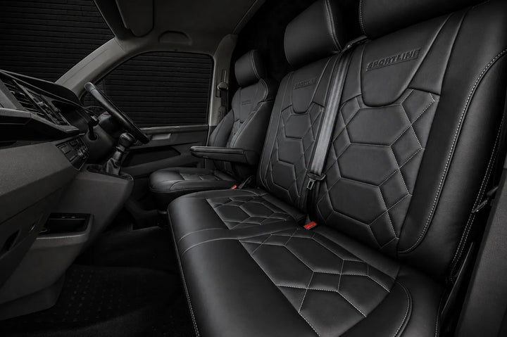 Black leather front seats with geometric diamond quilting and 'Sportline' embroidery, shown installed inside a vehicle cabin.