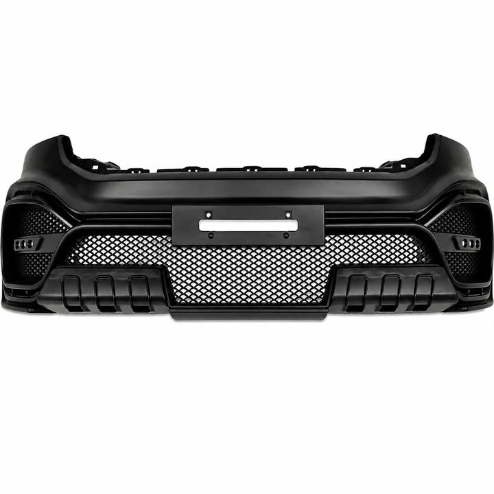 A black aftermarket car front bumper grille assembly with a honeycomb mesh pattern and integrated side fog light housings, shown against a plain white background.