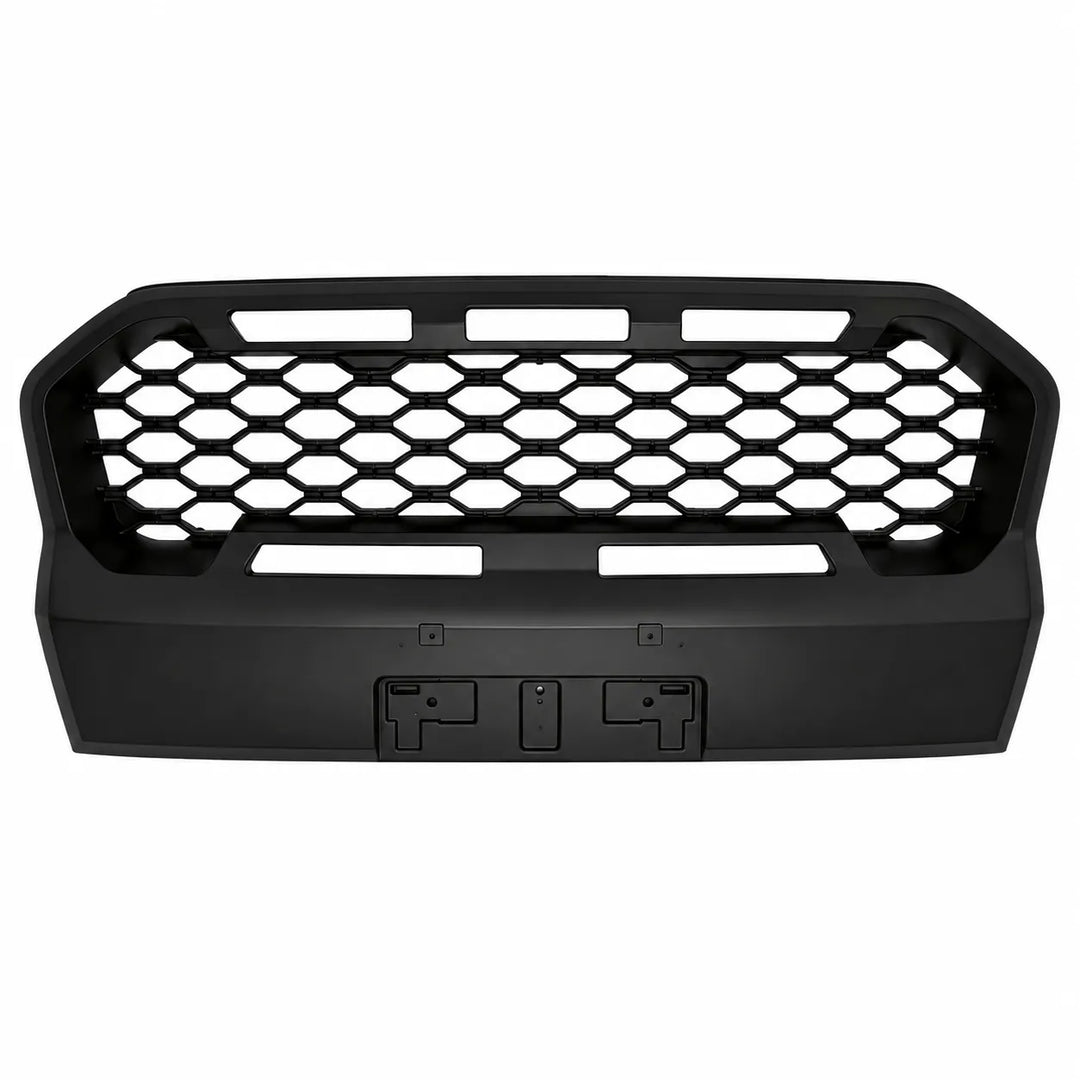 A black front grille insert with a honeycomb pattern and mounting slots, shown against a plain white background.