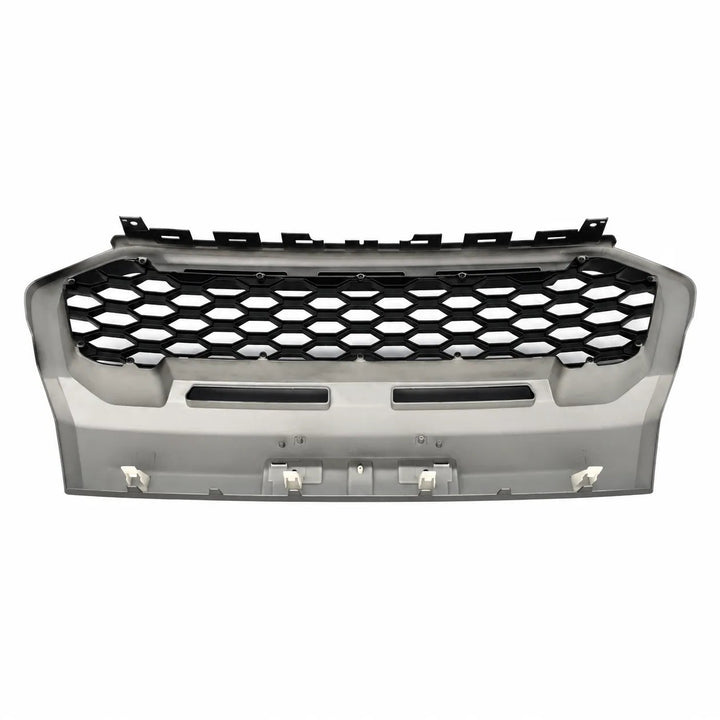 A vehicle front grille assembly with a black honeycomb pattern and a gray plastic frame, shown against a plain white background.