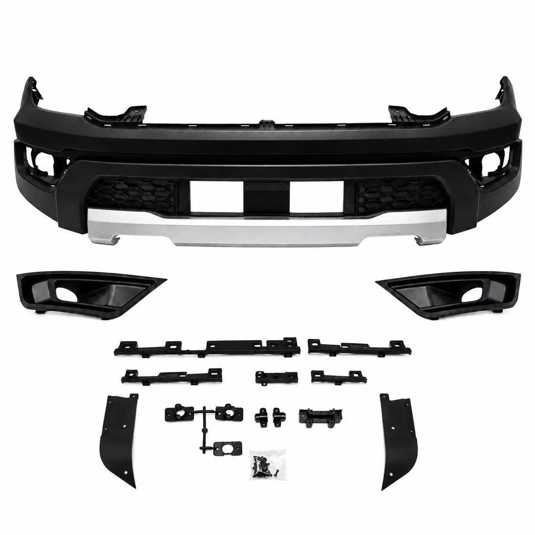 Black and silver front bumper kit with matching fog light housings and mounting hardware, displayed on a clean white background.