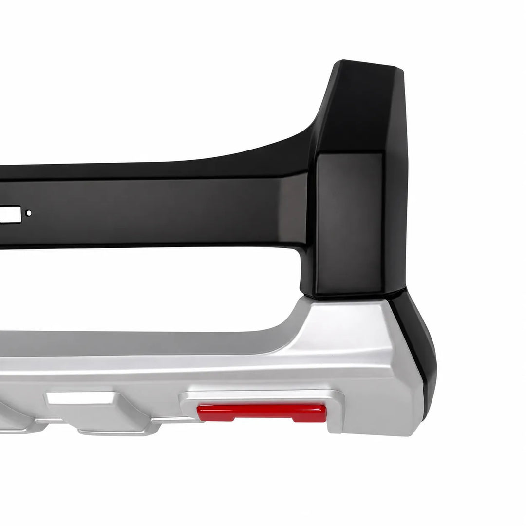 Close-up of a vehicle bumper bar or tow bar attachment with a black unpainted upper section and a silver lower section, featuring a small red accent, on a white background.