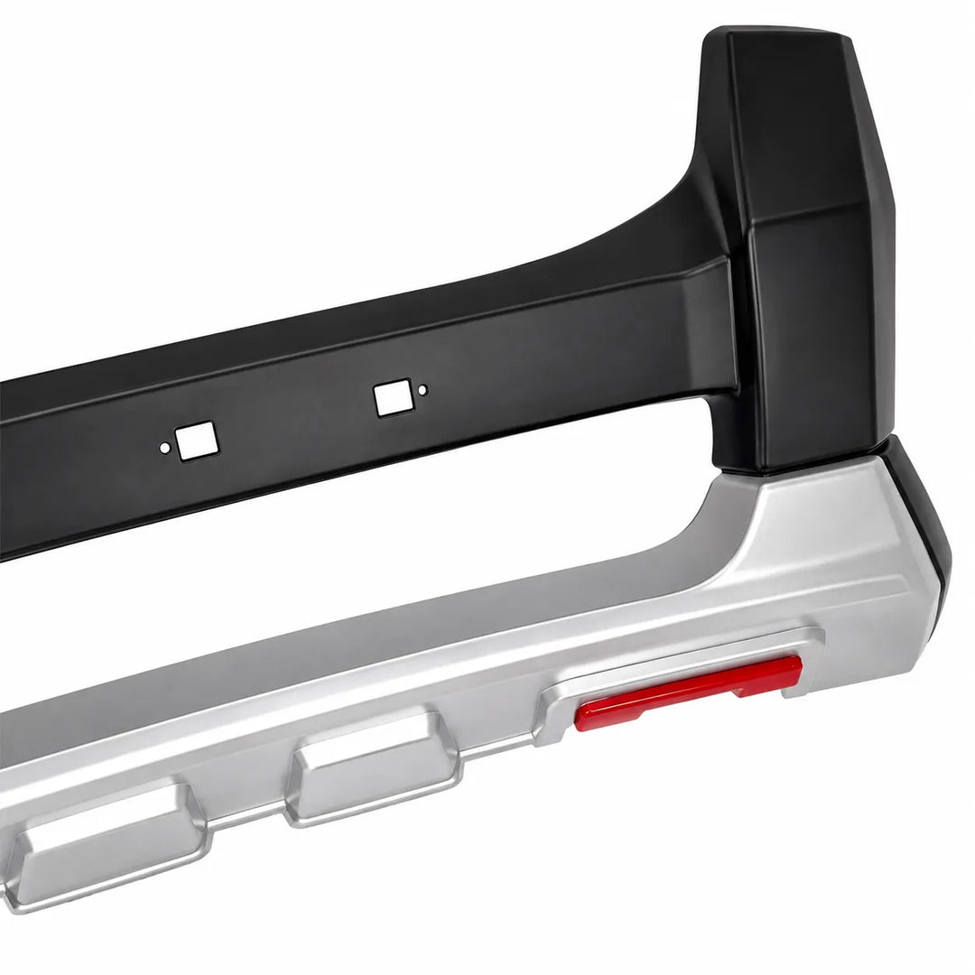 Close-up of a vehicle bumper cover protective bar with a unpainted black upper section, silver lower section, and a red accent, shown on a white background.