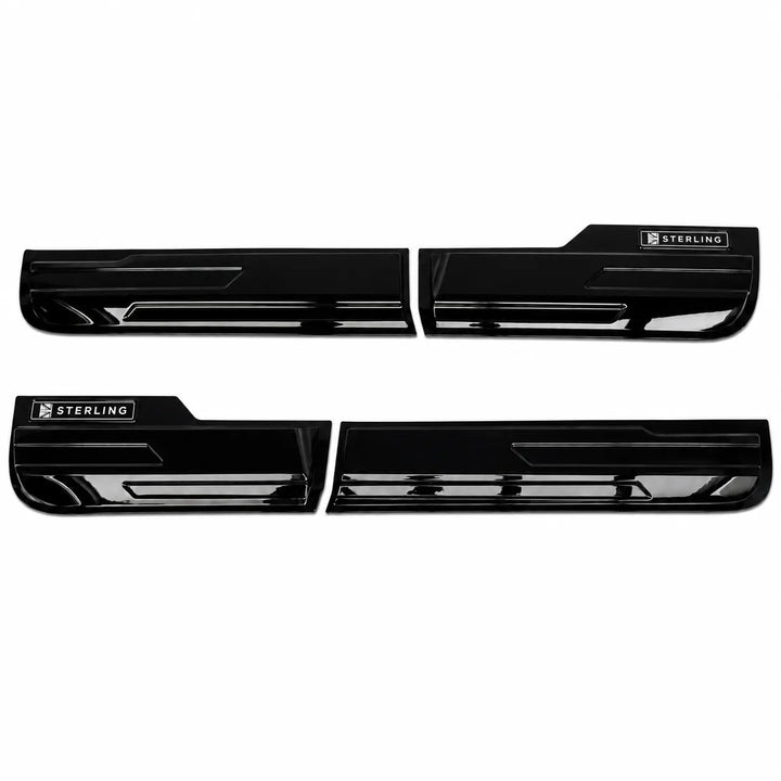 Four glossy black door sill trim pieces arranged in two pairs on a plain white background, each showing a small Sterling brand badge.