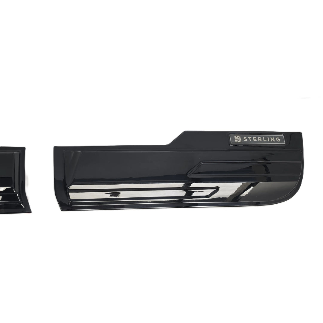 A glossy black car door handle trim piece with a silver 'STERLING' badge, shown against a plain white background.
