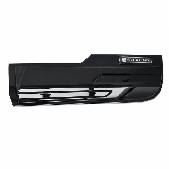 A glossy black automotive accessory, likely a bumper lip or trim piece, featuring a silver and black Sterling brand badge on the top right.