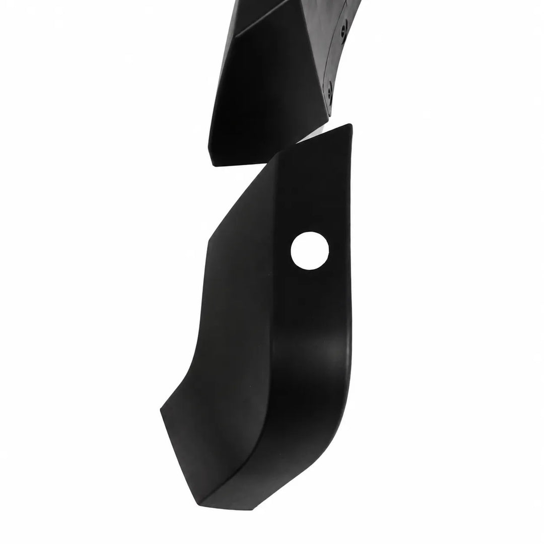 Front lower pair of wide arch fender flare black shot on a white background