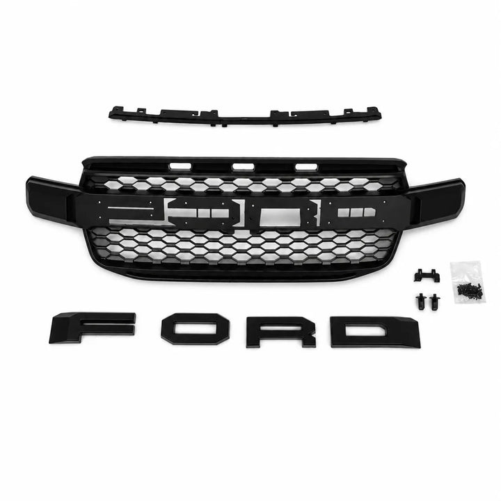 Black Ford grille kit with a honeycomb front grille, top trim piece, four 'FORD' individual letter badges, and mounting hardware on a white background.