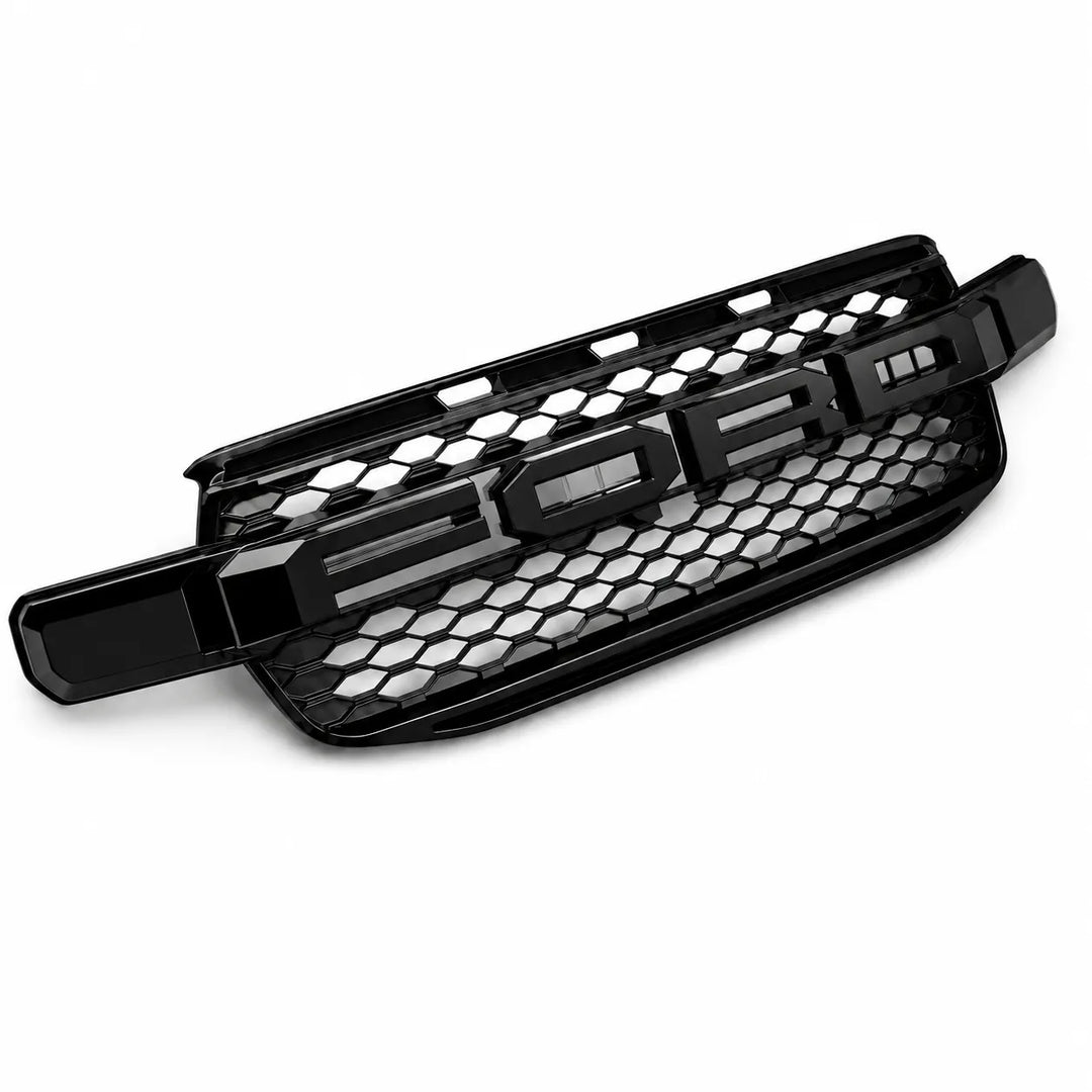 A black honeycomb mesh car grille with integrated black plastic trim and mounting clips, shown on a clean white background.