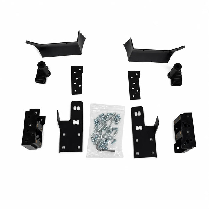 A black metal mounting bracket kit with various brackets, plates, and a clear bag of silver mounting hardware, arranged on a white background.