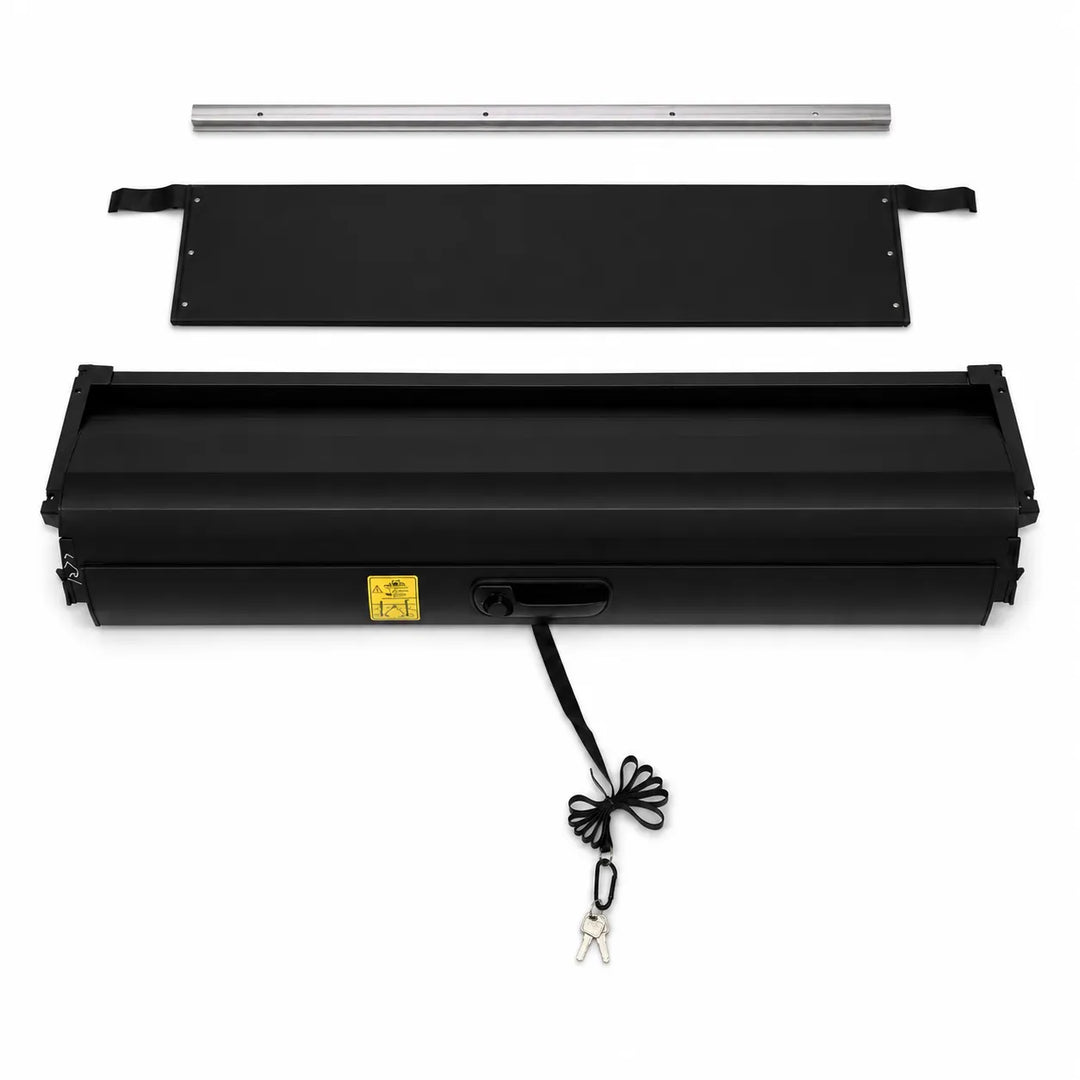 Black metal outdoor truck bed roller shutter with a long rectangular housing, a silver mounting pole, a black mounting plate, shown on a white background.