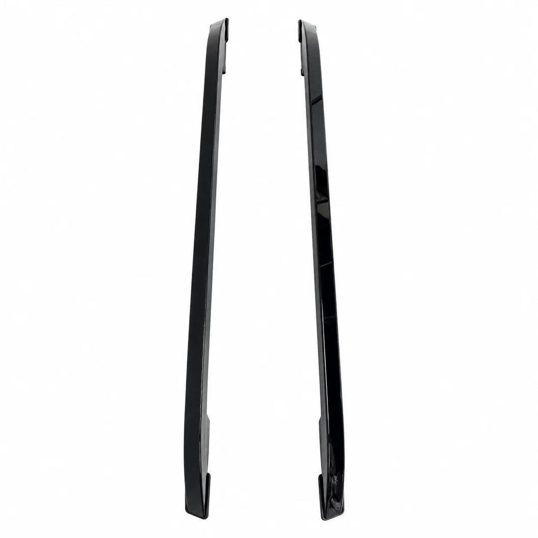 Two long, narrow roof rails upper black metal trim pieces shown upright on a plain white background.