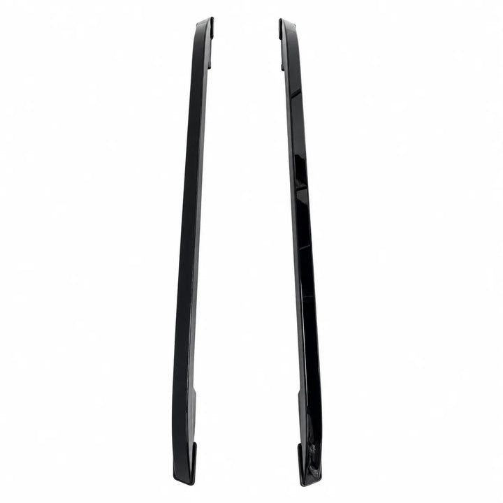 Two long, narrow roof rails upper black metal trim pieces shown upright on a plain white background.