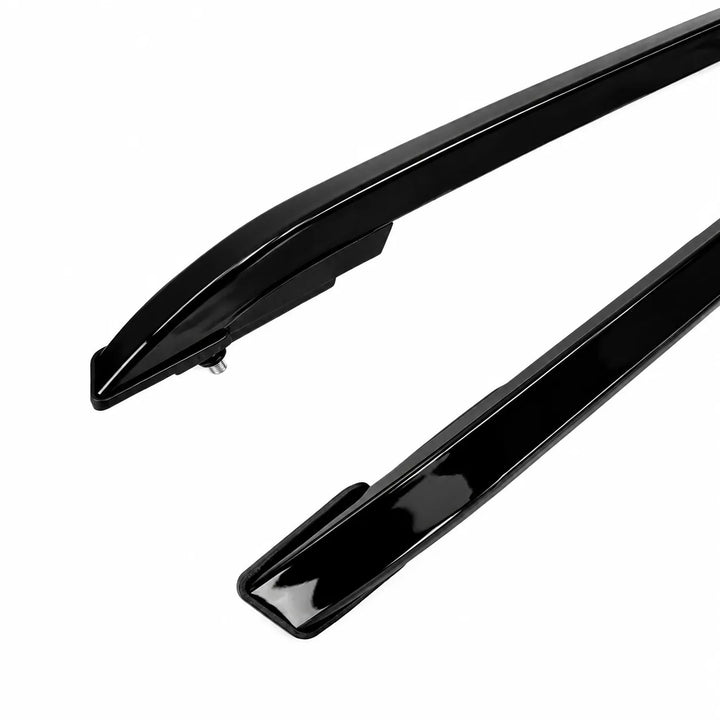 Two glossy black automotive roof rails shown on a plain white background.