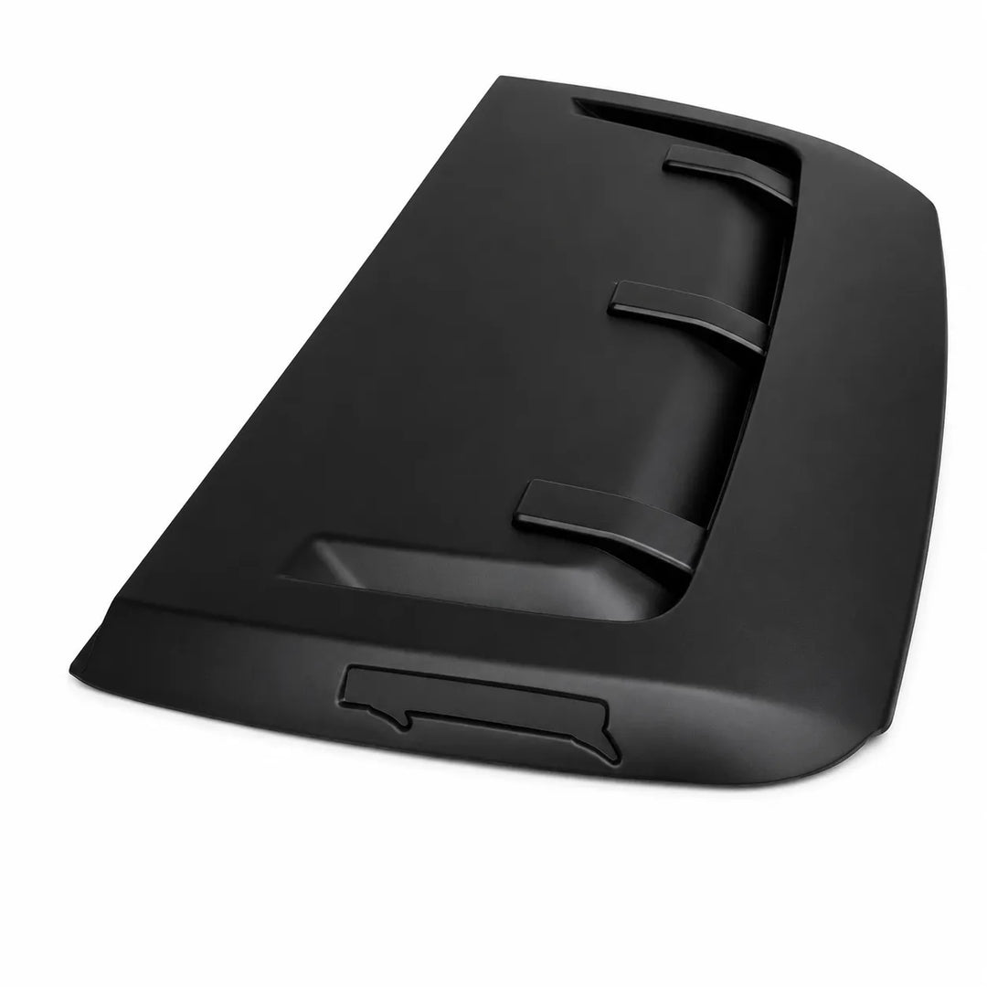 A black molded plastic automotive part, likely a hood ornament or decorative trim piece, shown on a clean white background.