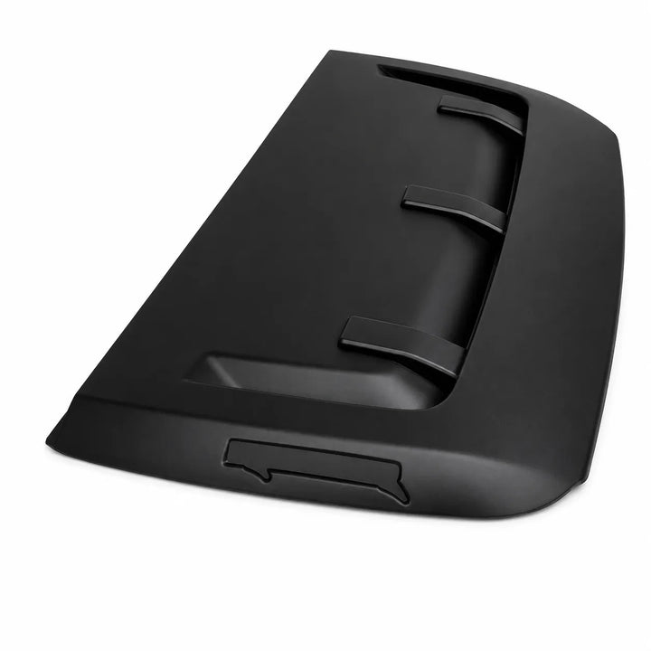 A black molded plastic automotive part, likely a hood ornament or decorative trim piece, shown on a clean white background.