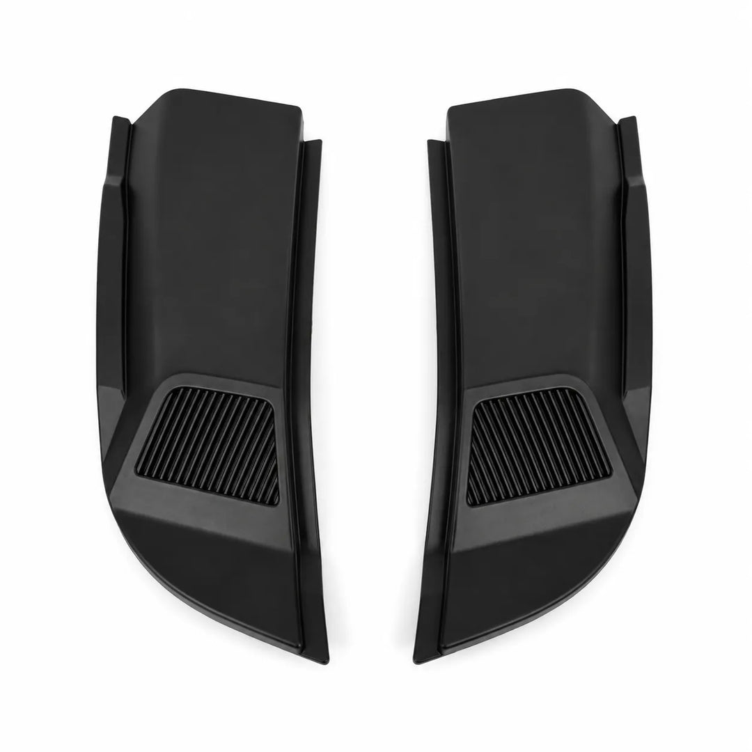 A pair of matte black plastic vehicle side bonnet vent light covers with ribbed sections, shown on a clean white background.