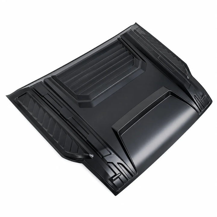 A black molded plastic automotive hood ornament or decorative hood piece, shown from an elevated angle on a plain white background.