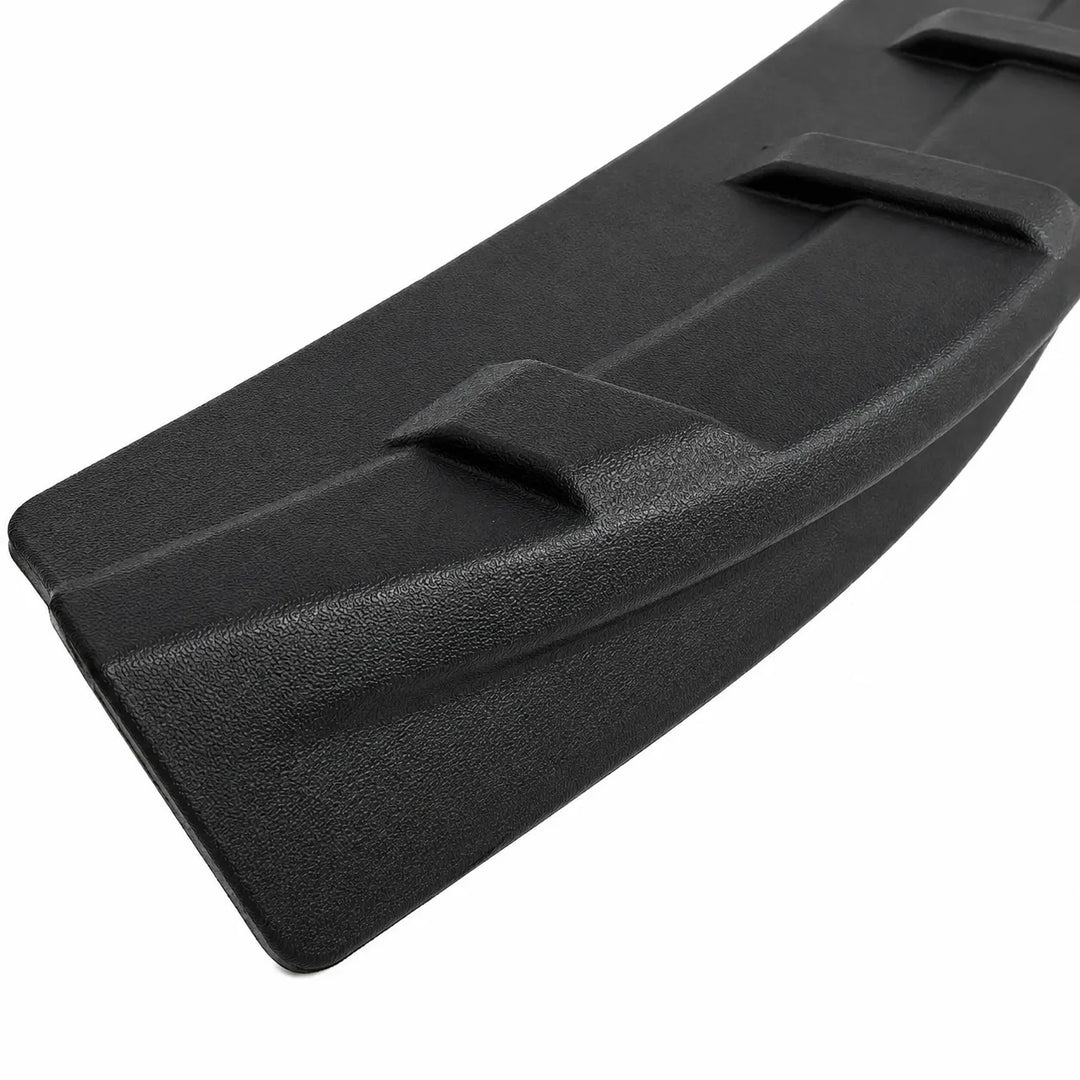 A close-up of a black textured molded plastic ABS Rear Tailgate Spoiler, tailgate trim, protective cover, shown against a plain white background.
