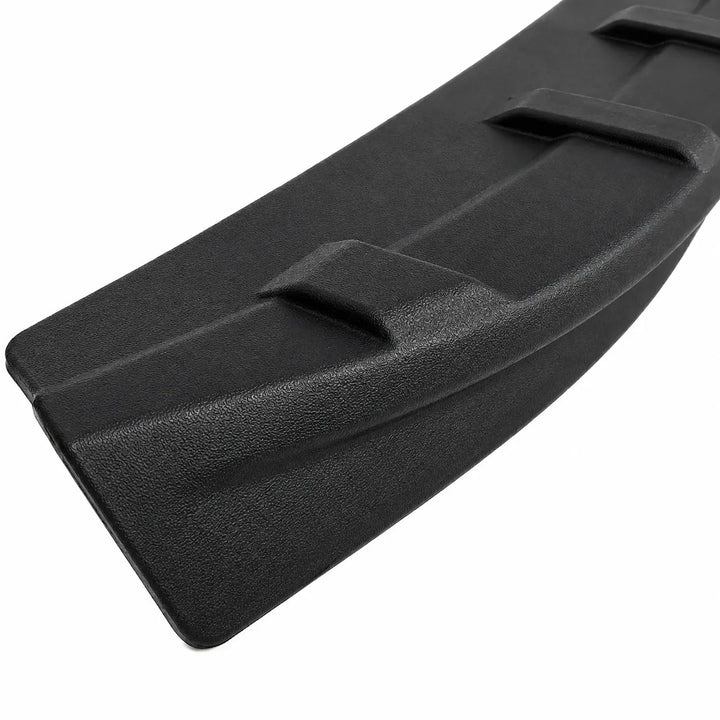 A close-up of a black textured molded plastic ABS Rear Tailgate Spoiler, tailgate trim, protective cover, shown against a plain white background.
