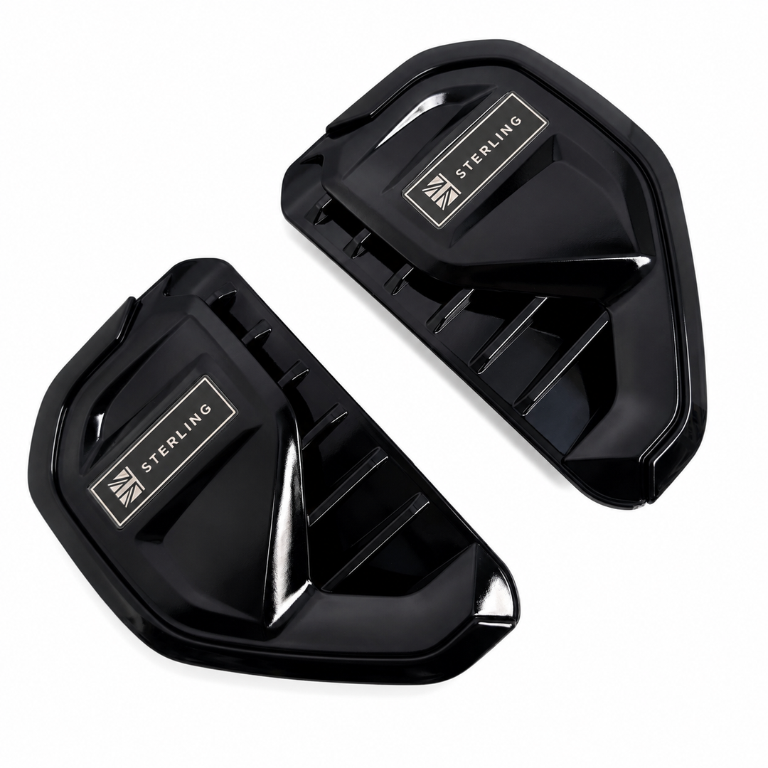 A pair of glossy black Side Vent guards with silver 'STERLING' brand badges, displayed on a clean white background.