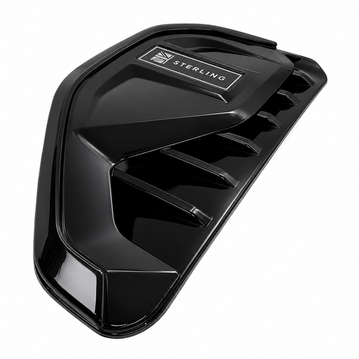 A glossy black molded plastic engine cover with a silver and black Sterling logo on the top, shown on a plain white background.